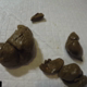 A masked girl in a red sweater bends over and lets out farts for the camera before a soft turd slides out of her ass. She wipes, then shows off the pile of turds she left behind. Presented in 720P HD. 58MB, MP4 file. About 6 minutes.